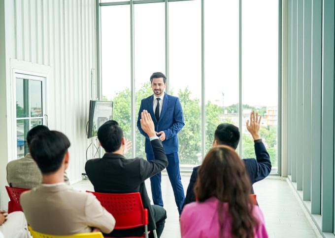 conference meeting. Business people sitting in a room listening to the motivator coach. Representation of a Self-growth and improvement special event